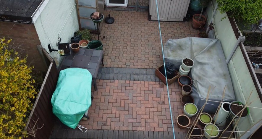 Clean back patio after pressure washing
