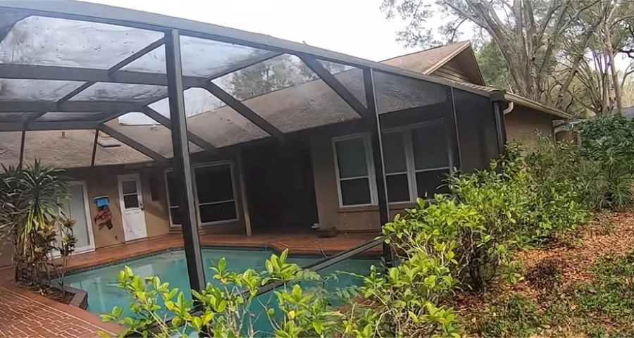 Pool enclosure from another side with clean screens after cleaning